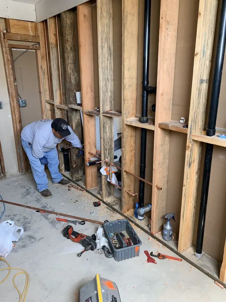 Commercial rough-in plumbing for Water Heater Replacement in Elmwood